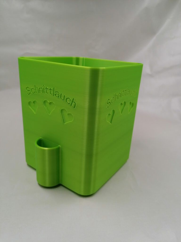 ein Bild von einem 3d gedruckten blumentopf. Gedruckt mit dem Filament  OVERTURE Silk PLA Neon Green Silk 